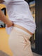 Розкльошені легкі штани бежевого кольору | 6865937 | фото 2