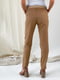 Коричневі бавовняні штани звуженого крою з бандажною резинкою під животик | 6865947 | фото 4