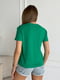 Зелена бавовняна футболка з принтом та написом | 6871790 | фото 3