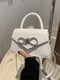 Біла сумка крос-боді зі сріблястим декором | 6875351 | фото 2