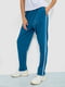 Трикотажные синие брюки зауженного фасона с лампасами | 6888942 | фото 3