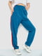 Трикотажні сині штани прямого фасону з лампасами | 6888943 | фото 3