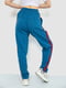 Трикотажные синие брюки прямого фасона с лампасами | 6888943 | фото 4