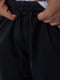 Трикотажные черные брюки с красно-серой вставкой | 6888970 | фото 6